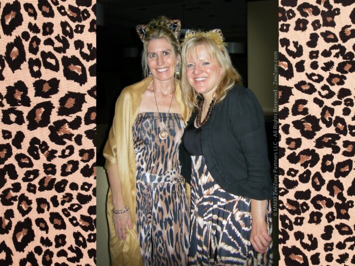 Deb and Sue Logan, both wearing leopard print dresses.