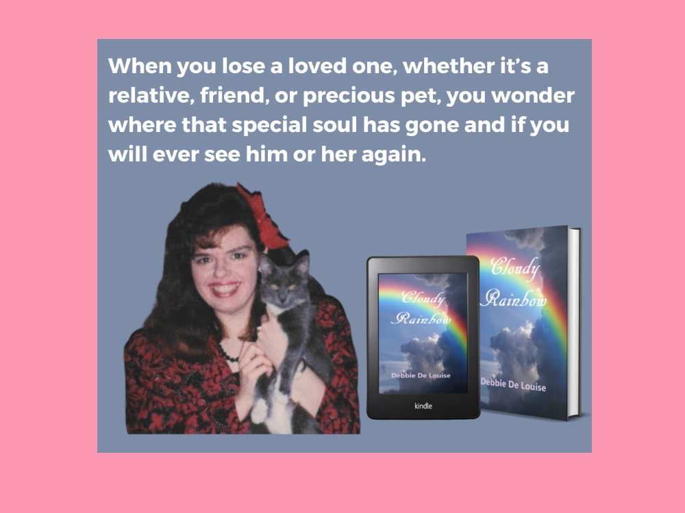 Debbie and her cat, along with copies of her novella, Cloudy Rainbow.