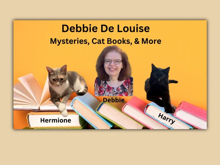 Debbie with cats Hermione and Harry, and some books.