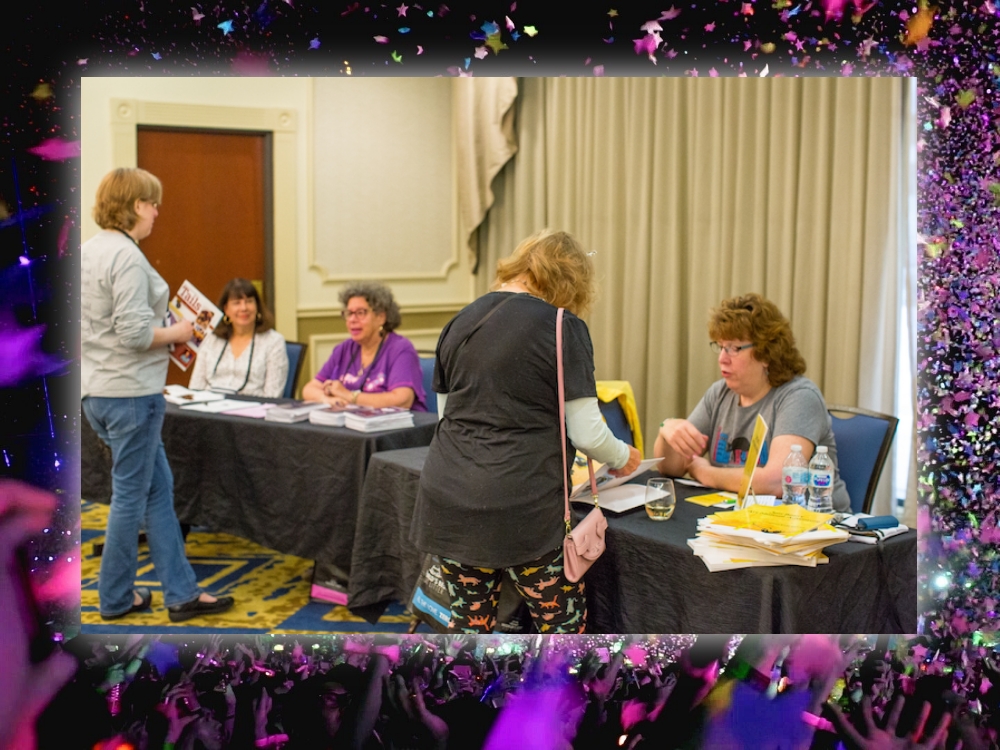 Conference goers checking out vendors.