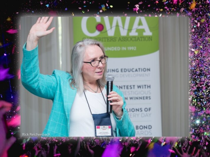 CWA President waving at the audience.