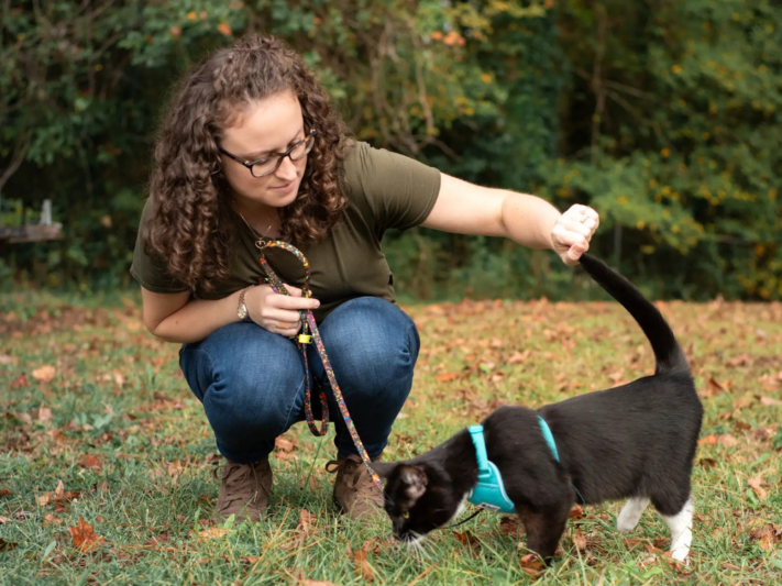 woman with cat outside