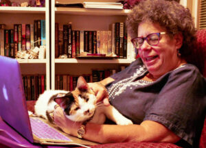 Ruth E. Thaler-Carter holding calico cat