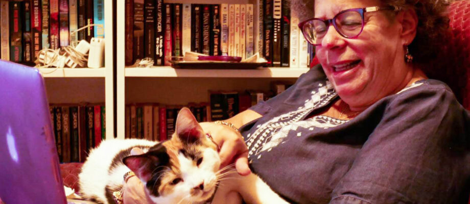 Ruth E. Thaler-Carter holding calico cat